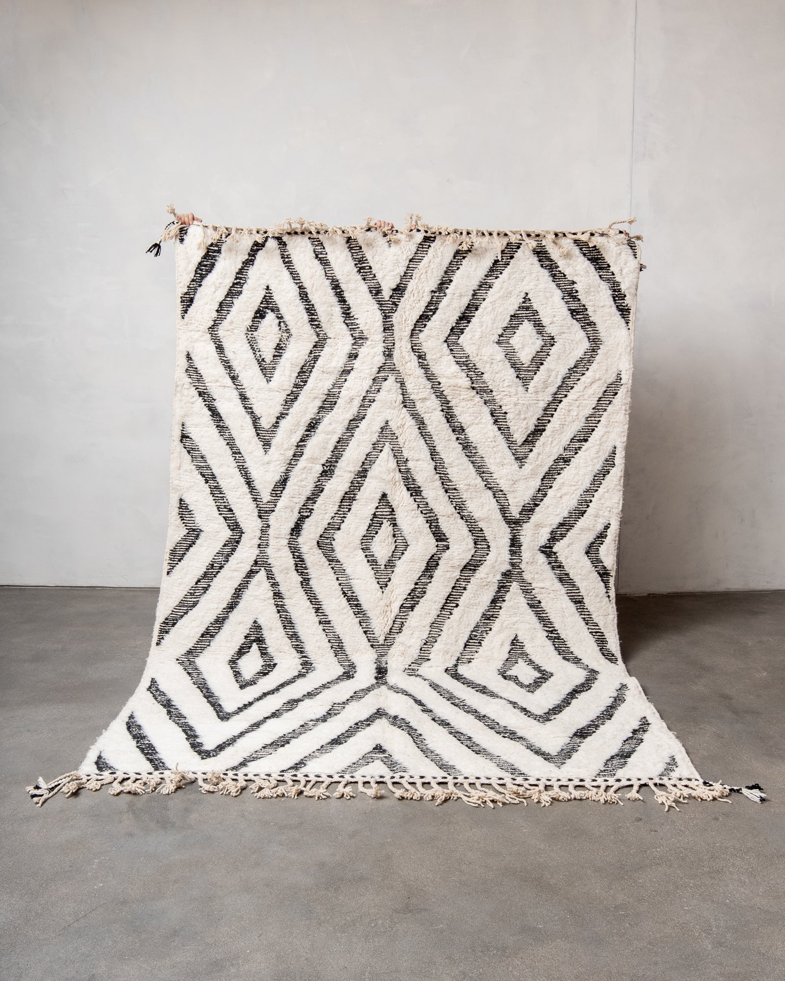 Modern, designer, handcrafted Berber rug from Morocco. Beniourain carpet with beautiful colours and patterns and fluffy wool texture.